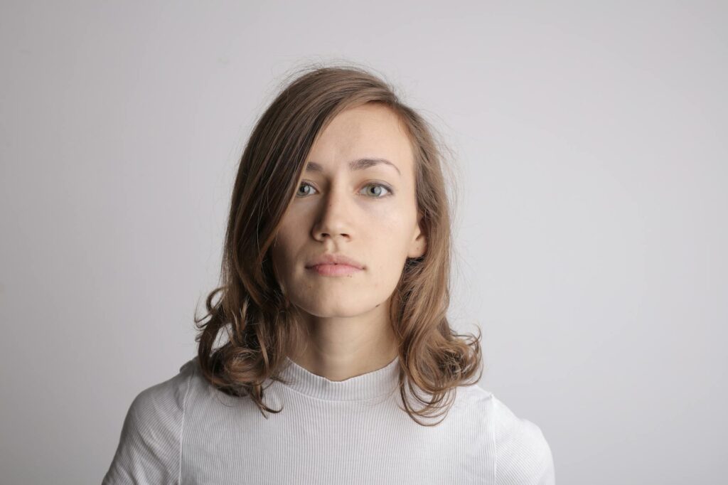 woman in white turtleneck shirt