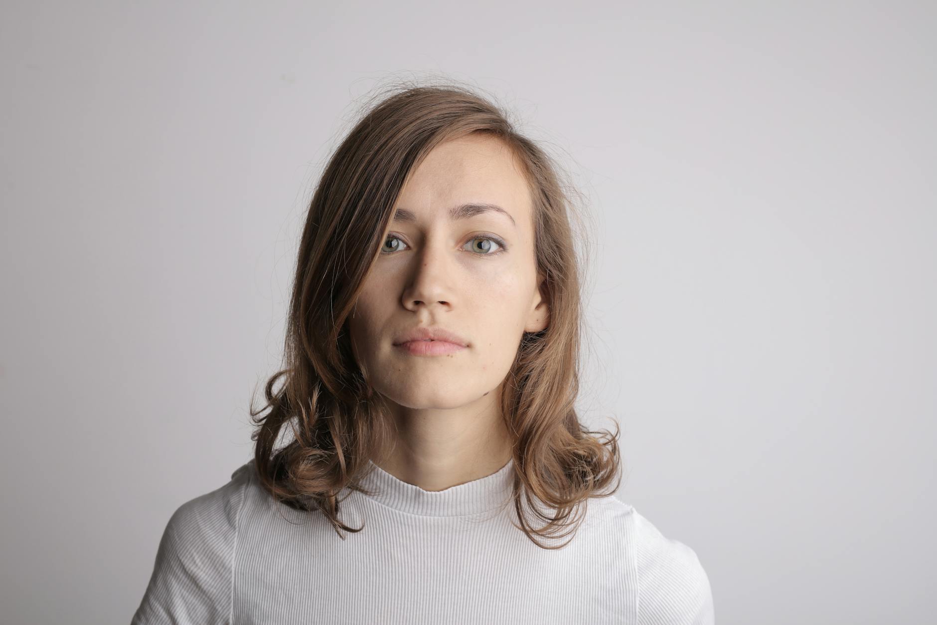 woman in white turtleneck shirt